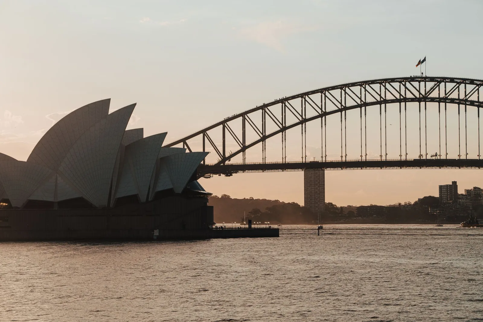 The Sydney Opera House and Sydney Harbour Bridge on Sydney Harbour, Australia — every short-stay visitor needs an entry authorisation before they fly
