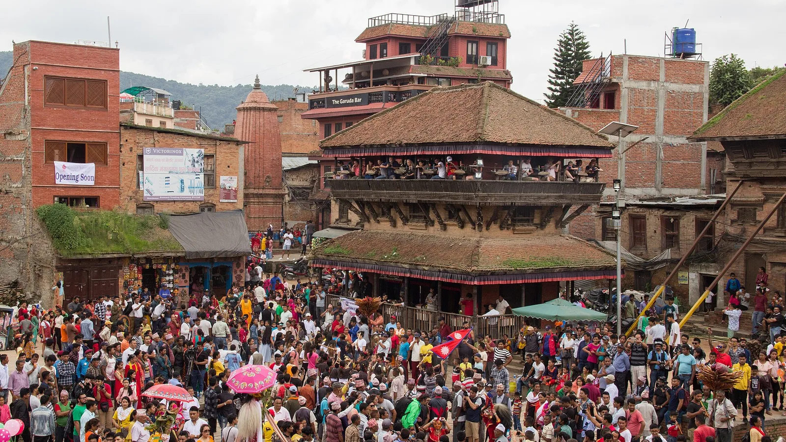 A crowd gathered by the Nyatapola temple in Bhaktapur during the Gai Jatra festival, Kathmandu Valley, Nepal