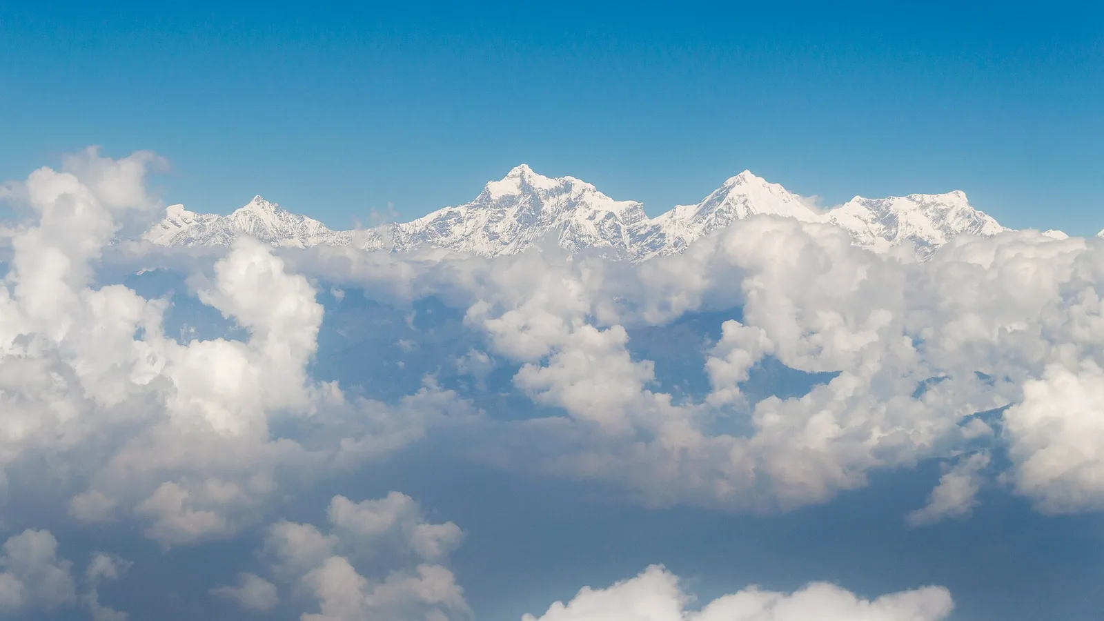 The Ganesh Himal massif above the Ruby Valley trek on the Dhading–Gorkha border, Nepal — the trail sits west of the flood-hit Bhote Koshi but its Syabrubesi gateway and access roads were disrupted by the 2026 flood