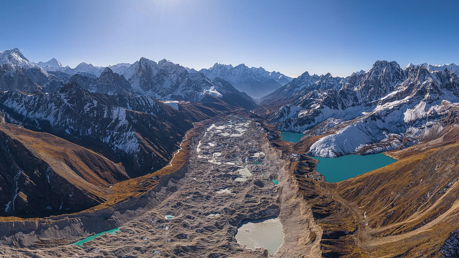The turquoise Gokyo Lakes and Gokyo village below Gokyo Ri in the Khumbu (Everest region), Nepal — reached via Lukla and unaffected by the 2026 Rasuwa flood