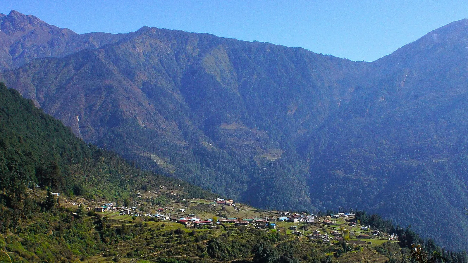 The Hyolmo Buddhist village and terraced hills of Helambu (Sermathang / Tarke Ghyang) in southern Sindhupalchowk, Nepal — the trail sits in the Melamchi–Indrawati watershed and was not hit by the Rasuwa flood, but Helambu borders the disruption zone and its monsoon-fragile Melamchi–Helambu approach road should be reconfirmed before travelling