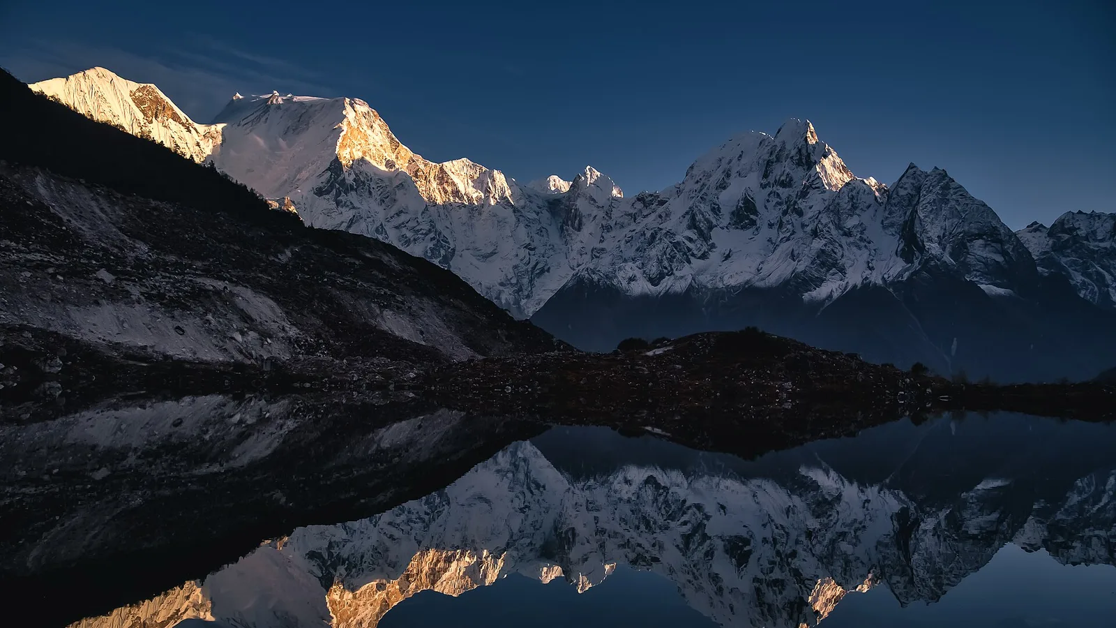 Mount Manaslu (8,163 m) above the Manaslu Circuit trek in the Gorkha district, Nepal — the route drains the Budhi Gandaki, a separate river system from the flood-hit Bhote Koshi