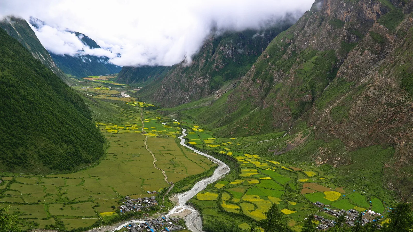 A stone Buddhist village and monastery in the Tsum Valley, Manaslu region of Gorkha district, Nepal, on the Budhi Gandaki — a separate valley from the flood-hit Bhote Koshi and running normally