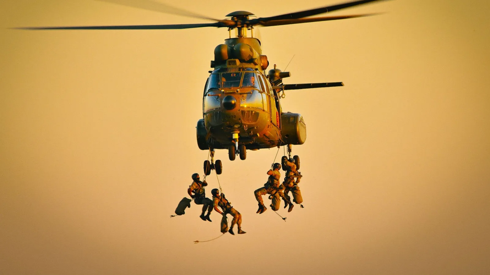 File photo: a military helicopter airlifting personnel, illustrating the kind of air rescue mounted after the 2026 Rasuwa flood