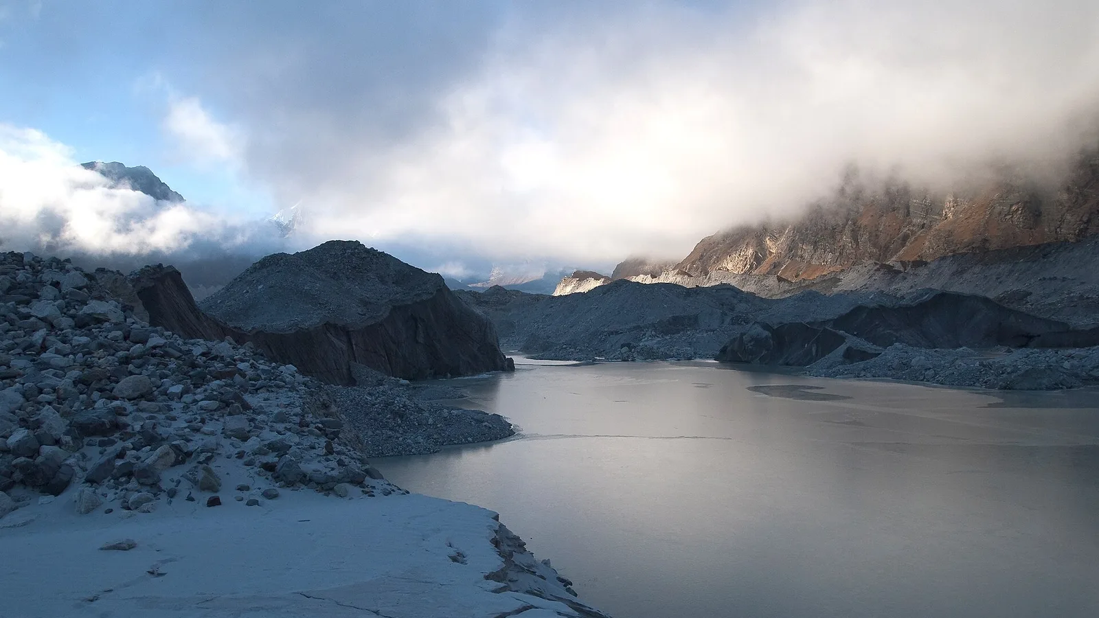 File photo: a debris-dammed lake ponding behind a natural barrier in a Himalayan river valley — an illustrative context image of the barrier-lake hazard, not the 2026 Bhote Koshi lake itself
