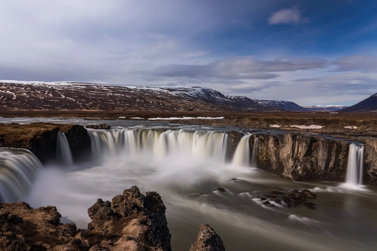 A calm Icelandic landscape of mountains and open country — Iceland ranks as the most peaceful country in the world on the Global Peace Index