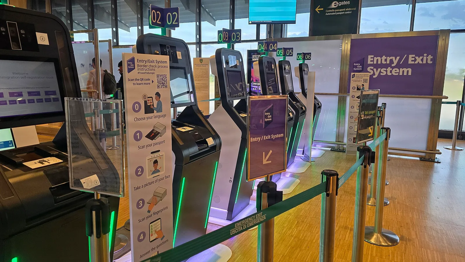 An Entry/Exit System (EES) self-service biometric kiosk at a European border — the system that now counts Schengen 90/180-day stays automatically, 2026