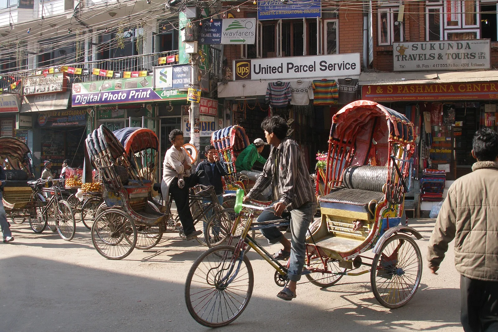 A busy tourist street in Thamel, Kathmandu — Nepal’s trekking hub, where travellers should vet operators and watch for common street scams