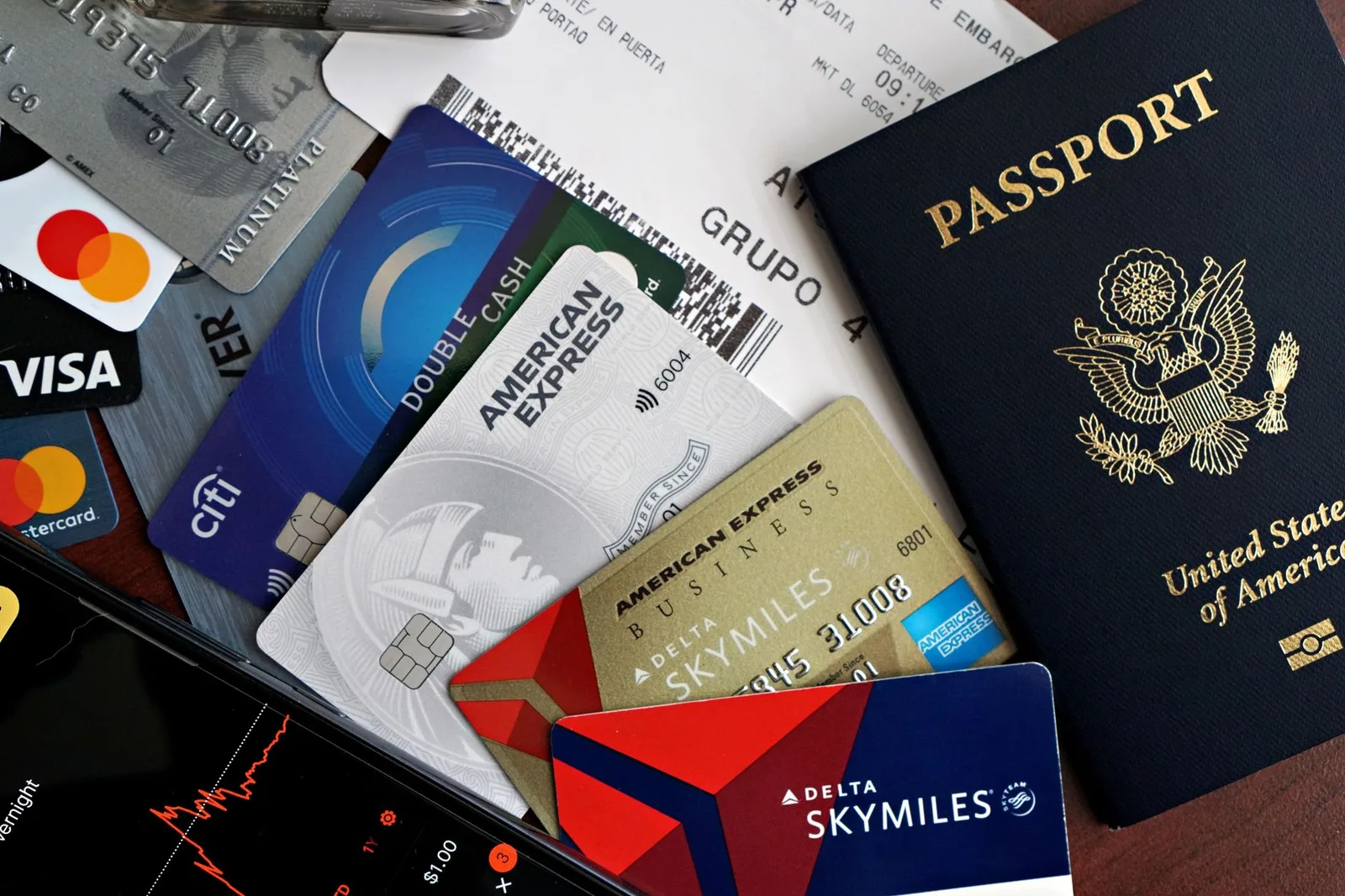 A passport at an airport departures area — travellers from dozens of countries now need a UK Electronic Travel Authorisation before they fly